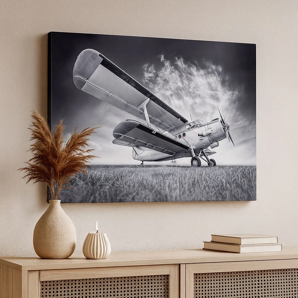 Canvastavla - Bild på duk - Ett flygplan mot en dramatisk himmel i svartvitt - 70x50cm - Bevingad vandrare - Modern väggdekoration för vardagsrum och sovrum ARTTOR