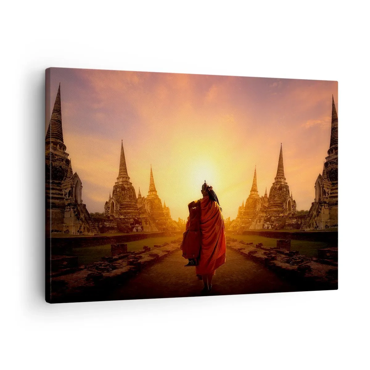Canvastavla - Bild på duk - En munk bland templen vid solnedgången - 70x50cm - I lugn genom evigheten - Modern väggdekoration för vardagsrum och sovrum ARTTOR