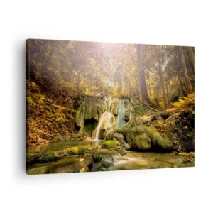 Canvastavla - Bild på duk - Ett skogsvattenfall i solens strålar, omgivet av grönska - 70x50cm - Skogkaskad i grönt - Modern väggdekoration för vardagsrum och sovrum ARTTOR