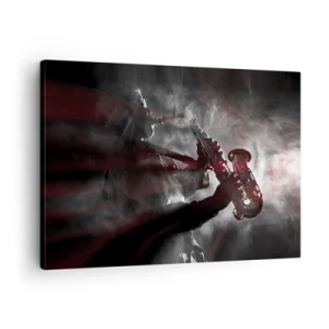 Canvastavla - Bild på duk - Saxofonist i rök på scenen i atmosfäriskt svart och rött - 70x50cm - I jazzens ångor - Modern väggdekoration för vardagsrum och sovrum ARTTOR