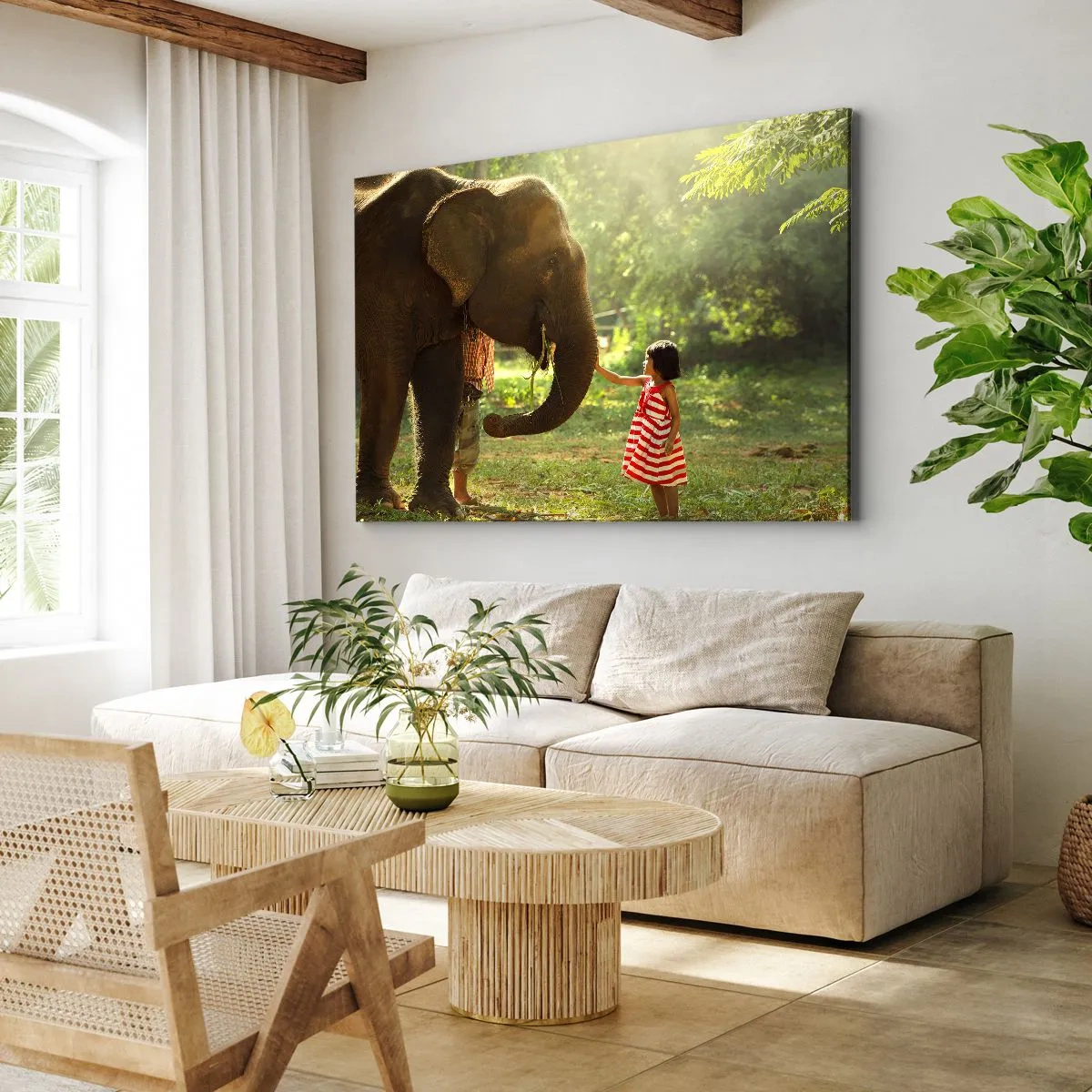Canvastavla - Bild på duk - En flicka i en röd klänning som rör vid en elefant i skogen. - 70x50cm - Vänskapens styrka - Modern väggdekoration för vardagsrum och sovrum ARTTOR