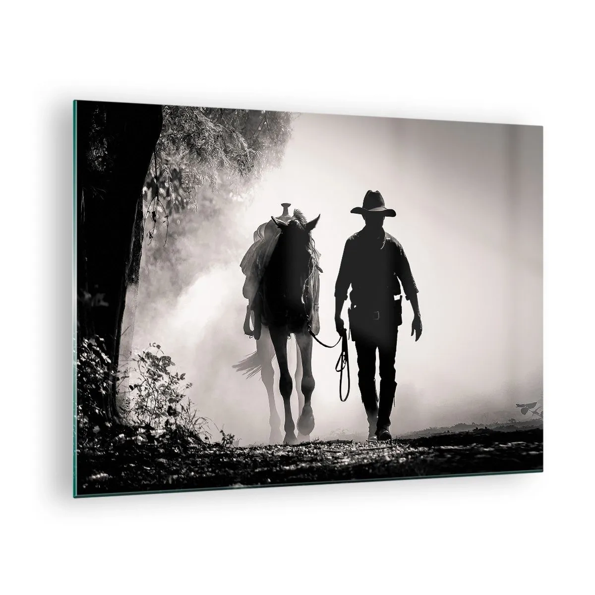 Glastavla - Bild på glas - Silhuetten av en cowboy som leder en häst genom ett dimmigt landskap - 70x50cm - En morgon i Texas - Modern väggdekoration för vardagsrum och sovrum ARTTOR