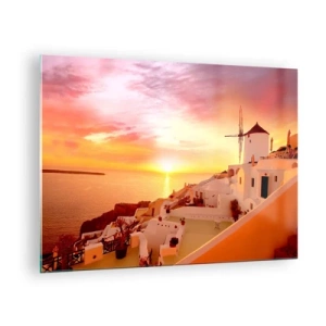 Glastavla - Bild på glas - Solnedgång över Santorini med vita byggnader och en väderkvarn - 70x50cm - Smälta sig in i vitt och guld - Modern väggdekoration för vardagsrum och sovrum ARTTOR