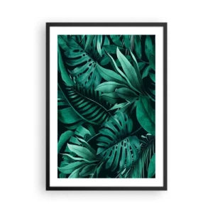 Affisch i svart ram - Tropiska löv i nyanser av grönt - 50x70cm - Tropiska grönskans djup - Modern väggdekoration för vardagsrum och sovrum ARTTOR