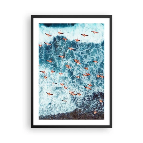 Affisch i svart ram - Flamingos ovanför havets vågor i intensiva färger - 50x70cm - Kustparad - Modern väggdekoration för vardagsrum och sovrum ARTTOR