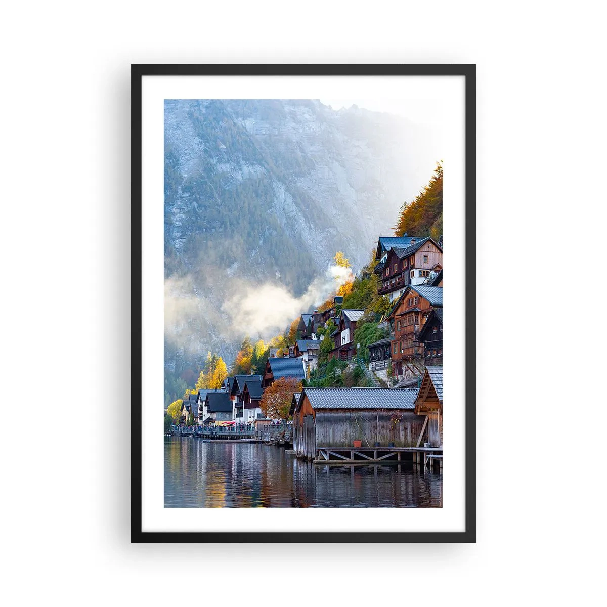 Affisch i svart ram - En bergsstad vid en sjö omgiven av höstlig aura - 50x70cm - Alpina klimat - Modern väggdekoration för vardagsrum och sovrum ARTTOR