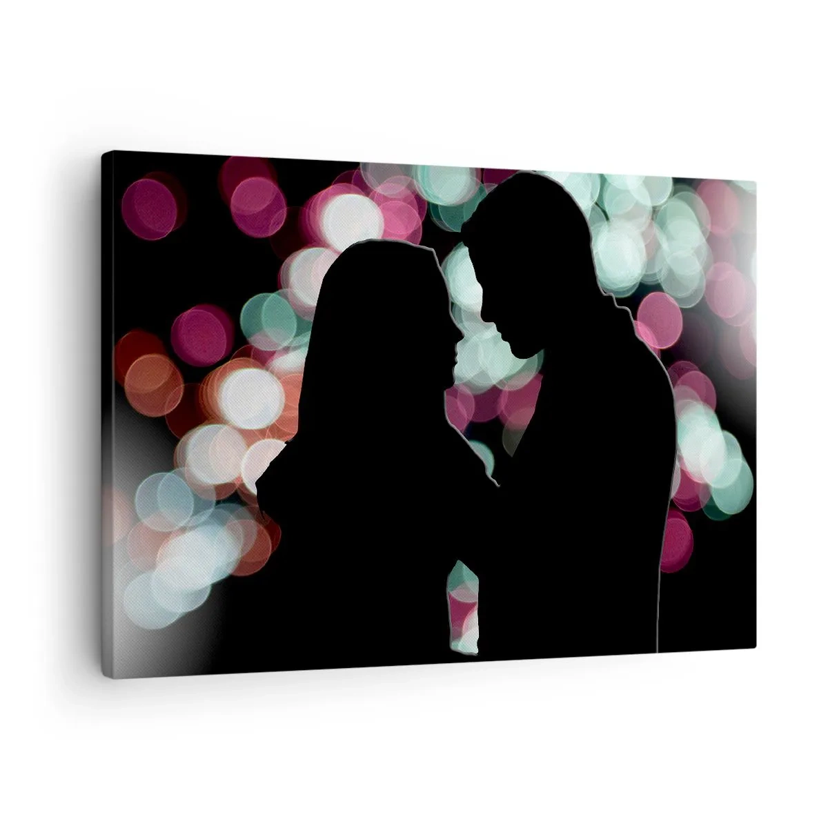 Canvastavla - Bild på duk - Silhuetter av ett par mot en bakgrund av färgglada bokeh-ljus - 70x50cm - Ja! - Modern väggdekoration för vardagsrum och sovrum ARTTOR