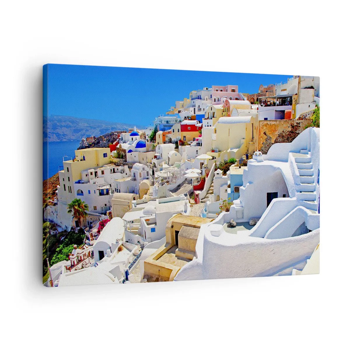 Canvastavla - Bild på duk - Panorama över Santorini med vita hus och blå himmel - 70x50cm - En dröm om grekisk sommar - Modern väggdekoration för vardagsrum och sovrum ARTTOR
