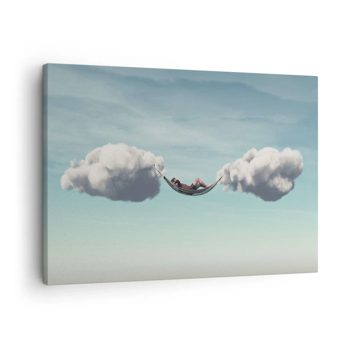 Canvastavla - Bild på duk - En person som kopplar av i en hängmatta som svävar i molnen - 70x50cm - Stundens salighet - Modern väggdekoration för vardagsrum och sovrum ARTTOR