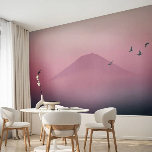 Fototapet Standard Eco - Ett berg i dimman vid solnedgången med flygande fåglar - 100x70cm - Vandrare över molnen - Modern väggdekoration för vardagsrum och sovrum ARTTOR