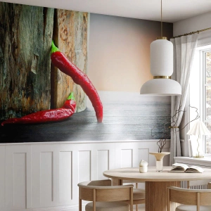 Fototapet Standard Eco - Röda chilipeppar på en träbakgrund - 100x70cm - Red hot chili peppers - Modern väggdekoration för vardagsrum och sovrum ARTTOR