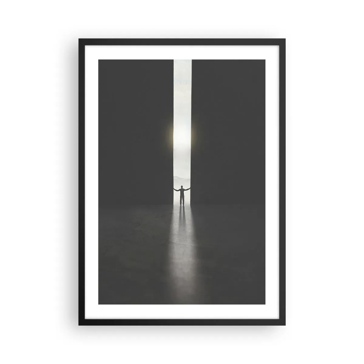 Affisch i svart ram - En man som står i ljuset av en spricka i en mörk miljö - 50x70cm - Ett steg mot den ljusa framtiden - Modern väggdekoration för vardagsrum och sovrum ARTTOR