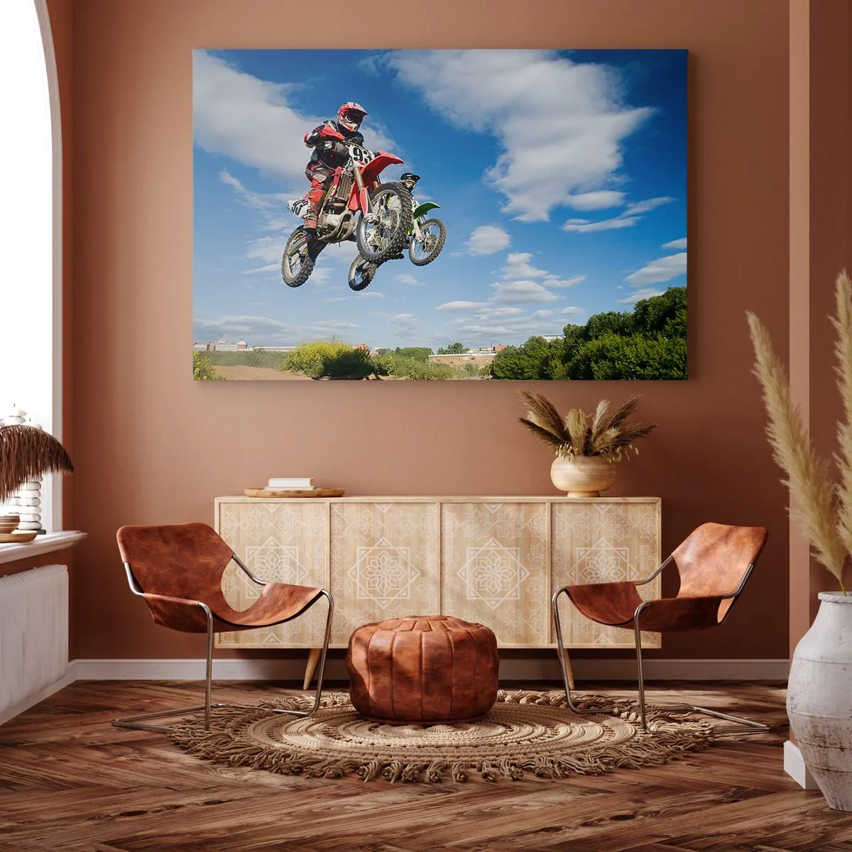 Canvastavla - Bild på duk - Förare på motocrosscyklar i luften under ett hopp - 70x50cm - Himmelsteg - Modern väggdekoration för vardagsrum och sovrum ARTTOR