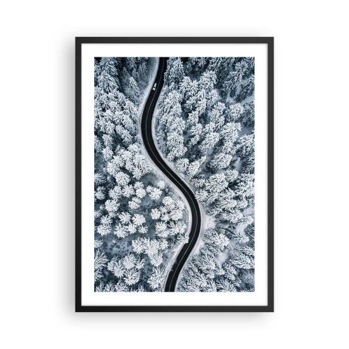 Affisch i svart ram - En pittoresk väg bland snötäckta träd från ett fågelperspektiv - 50x70cm - Genom vinterskogen - Modern väggdekoration för vardagsrum och sovrum ARTTOR