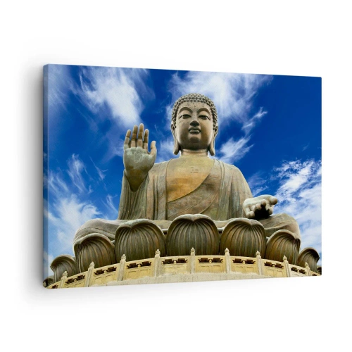 Canvastavla - Bild på duk - En monumental Buddhastaty mot en blå himmel med moln - 70x50cm - Lev utan rädsla - Modern väggdekoration för vardagsrum och sovrum ARTTOR
