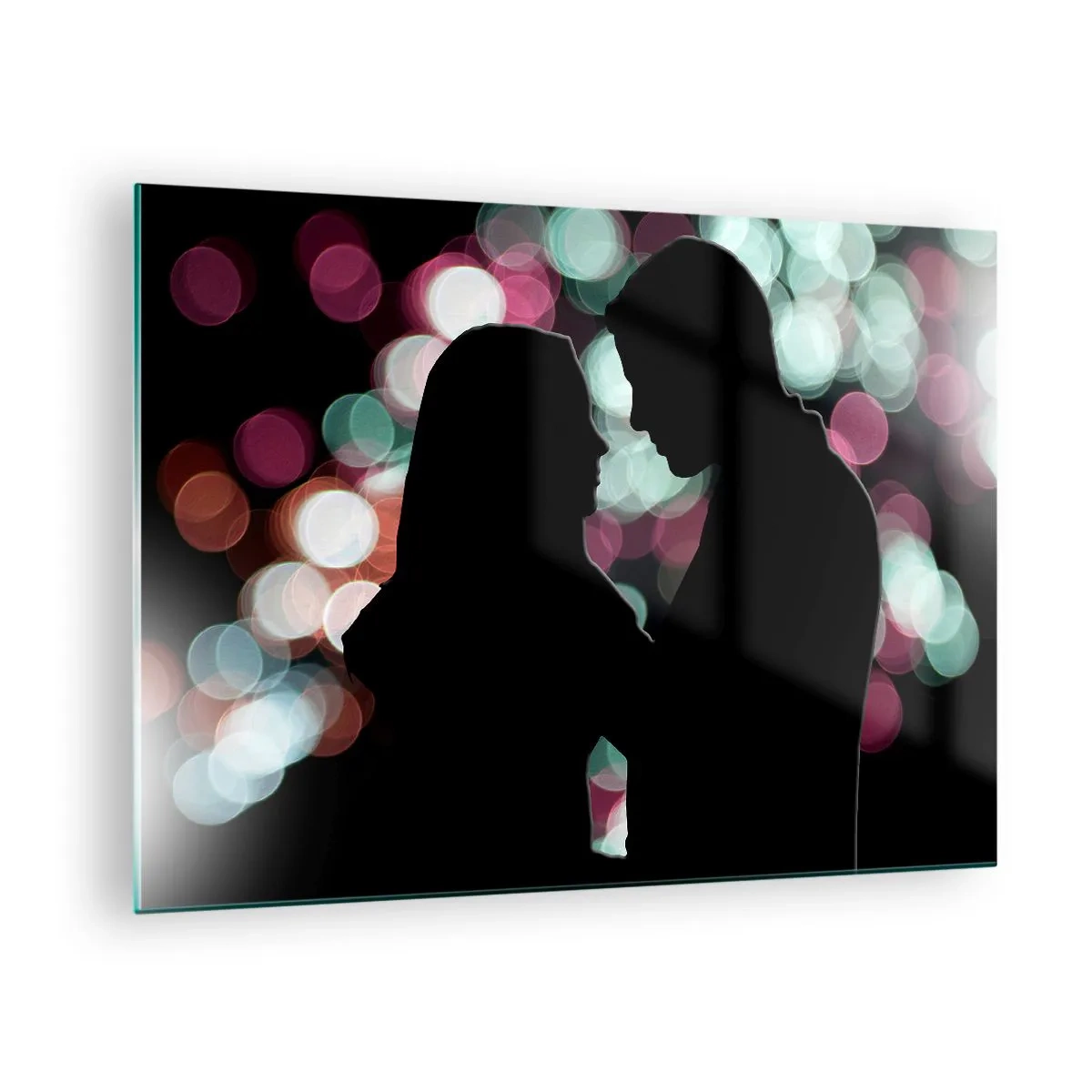 Glastavla - Bild på glas - Silhuetter av ett par mot en bakgrund av färgglada bokeh-ljus - 70x50cm - Ja! - Modern väggdekoration för vardagsrum och sovrum ARTTOR
