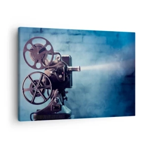 Canvastavla - Bild på duk - En gammal filmprojektor som kastar ljus mot en blå bakgrund - 70x50cm - I gamla biografen - Modern väggdekoration för vardagsrum och sovrum ARTTOR