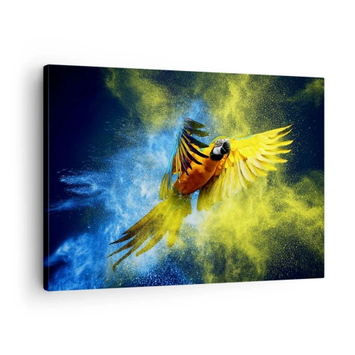 Canvastavla - Bild på duk - En papegoja i flykt mot en bakgrund av färgglada explosioner av gult och blått. - 70x50cm - I blå-gult damm - Modern väggdekoration för vardagsrum och sovrum ARTTOR