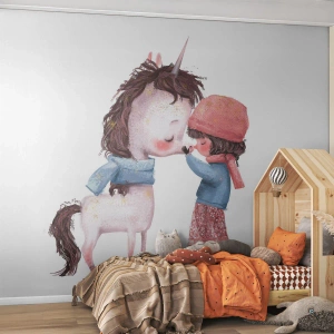 Fototapet Standard Eco - En flicka och en enhörning i varma kläder i en sagoillustration - 100x70cm - Vintersaga - Modern väggdekoration för vardagsrum och sovrum ARTTOR