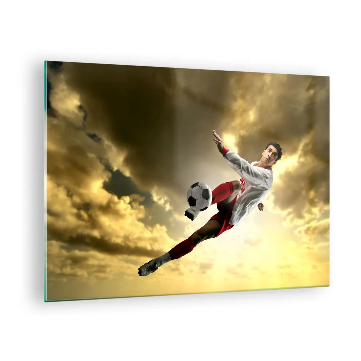 Glastavla - Bild på glas - En fotbollsspelare i aktion mot en gyllene himmel - 70x50cm - Fotbollshimmel - Modern väggdekoration för vardagsrum och sovrum ARTTOR