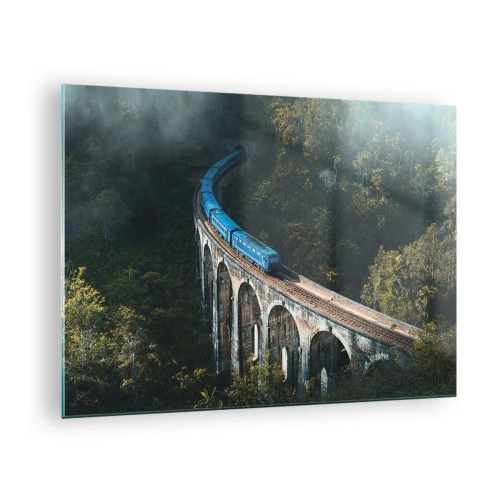 Glastavla - Bild på glas - Ett blått tåg som färdas längs en stenviadukt i skogen - 70x50cm - Attraktion till naturen - Modern väggdekoration för vardagsrum och sovrum ARTTOR