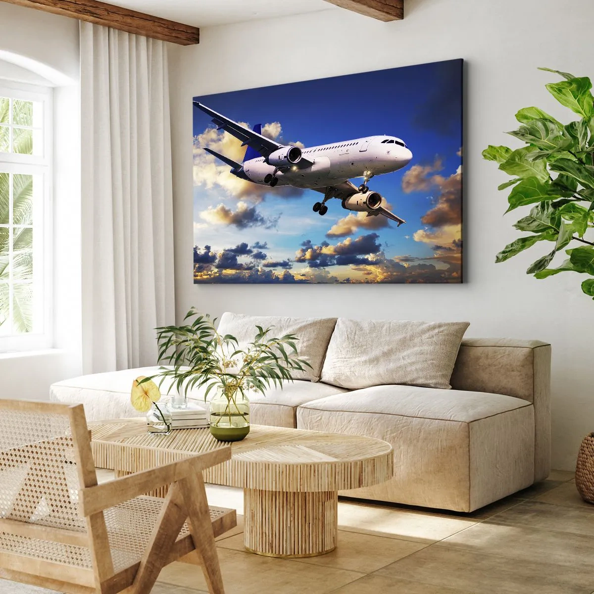 Canvastavla - Bild på duk - Ett passagerarplan mot molnen vid solnedgången - 70x50cm - Resa i vitt och blått - Modern väggdekoration för vardagsrum och sovrum ARTTOR