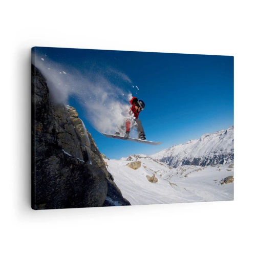 Canvastavla - Bild på duk - En snowboardåkare hoppar från en klippa mot ett bergslandskap - 70x50cm - Så blev du en del av vyn - Modern väggdekoration för vardagsrum och sovrum ARTTOR