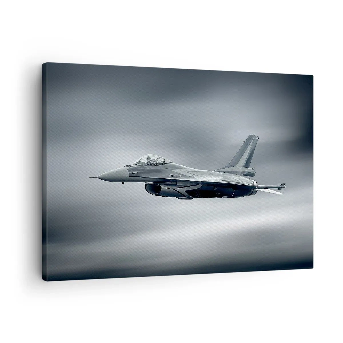 Canvastavla - Bild på duk - Ett jaktflygplan i flygning mot en molnig himmel - 70x50cm - Utmanar du? - Modern väggdekoration för vardagsrum och sovrum ARTTOR