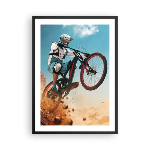 Affisch i svart ram - En mountainbiker utför ett dynamiskt hopp mot ett ökenlandskap. - 50x70cm - Cykelgalning - Modern väggdekoration för vardagsrum och sovrum ARTTOR