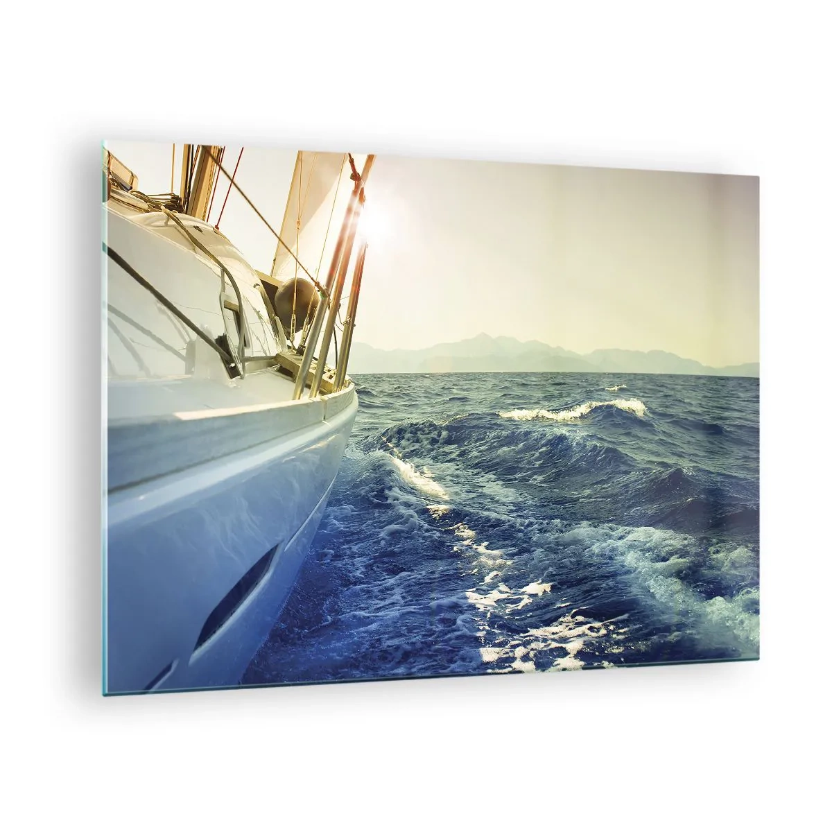 Glastavla - Bild på glas - En segelbåt på ett lugnt hav i ljuset av den nedgående solen - 70x50cm - Mot äventyret - Modern väggdekoration för vardagsrum och sovrum ARTTOR