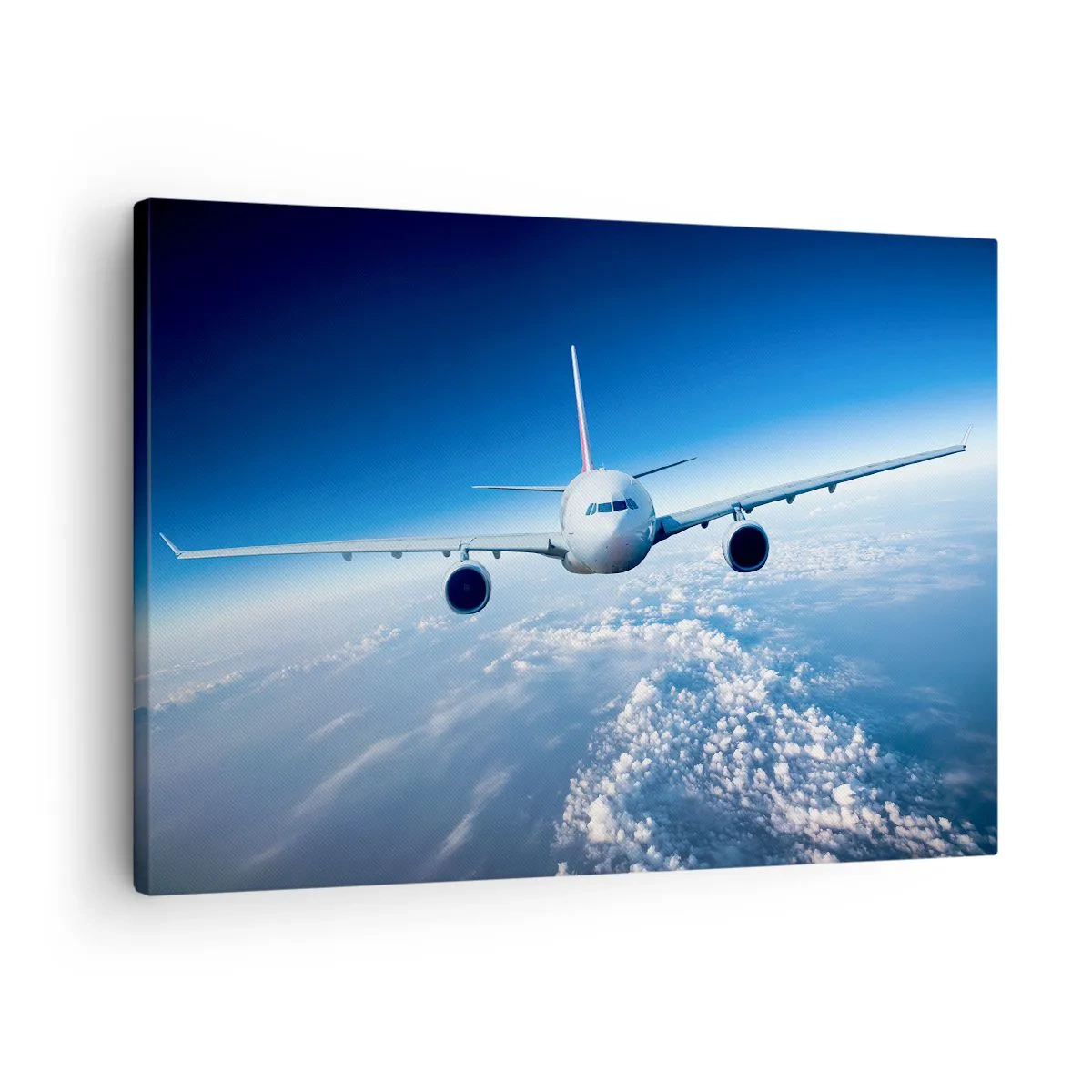 Canvastavla - Bild på duk - Ett flygplan som flyger över molnen mot en blå himmel - 70x50cm - Jag flyger för jag vill - Modern väggdekoration för vardagsrum och sovrum ARTTOR